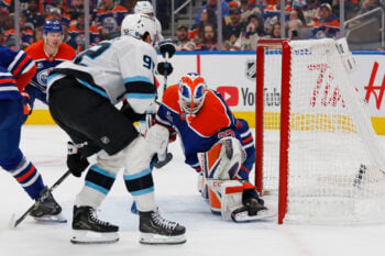 Oct 15, 2026; Edmonton, Alberta, CAN;  Utah Mammoth forward Logan Cooley (92) scores a goal during the second period against Edmonton Oilers goaltender Devon Levi (27) at Rogers Place.  Mandatory Credit: Perry Nelson-Imagn Images