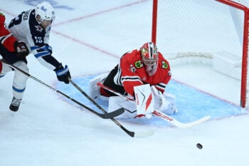 Oct 15, 2026; Chicago, Illinois, USA;  Winnipeg Jets center Gabriel Vilardi (13) shoots against Chicago Blackhawks goaltender Spencer Knight (30) during the third period at the United Center.  Mandatory Credit: Matt Marton-Imagn Images