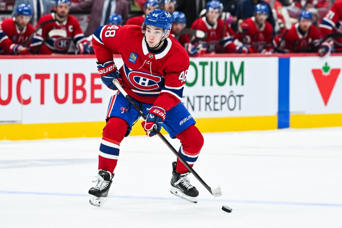 Oct 10, 2026; Montreal, Quebec, CAN; Montreal Canadiens defenseman Lane Hutson (48) plays the puck near the blue line against the Detroit Red Wings during the first period at Bell Centre. Mandatory Credit: David Kirouac-Imagn Images
