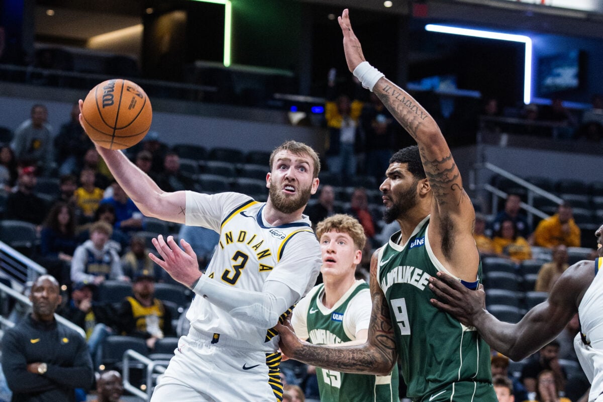 Oct 16, 2026; Indianapolis, Indiana, USA; Indiana Pacers guard Braden Smith (3) passes the ball while Milwaukee Bucks center Kel'el Ware (9) defends in the second half at Gainbridge Fieldhouse. Mandatory Credit: Trevor Ruszkowski-Imagn Images