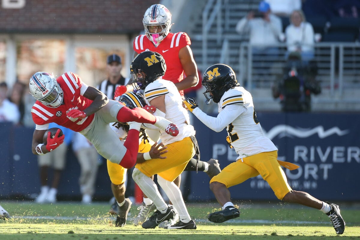 Oct 17, 2026; Oxford, Mississippi, USA; at Vaught-Hemingway Stadium.Mississippi Rebels running back Kewan Lacy (5)is tackled by Missouri Tigers safety Santana Banner (15) and safety Trajen Greco (4) at Vaught-Hemingway Stadium. Mandatory Credit: Petre Thomas-Imagn Images