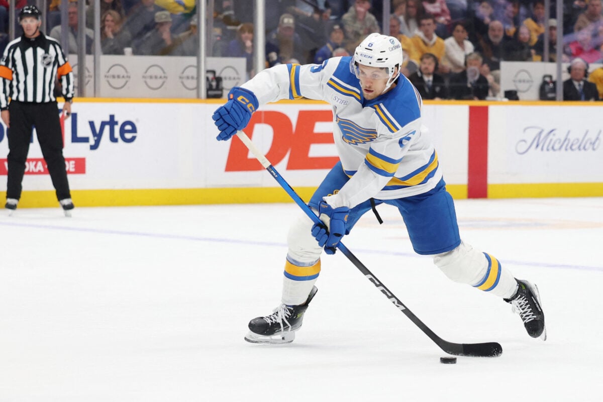 Oct 17, 2026; Nashville, Tennessee, USA; St. Louis Blues defenseman Philip Broberg (6) shoots the puck during the second period against the Nashville Predators at Bridgestone Arena. Mandatory Credit: Alan Poizner-Imagn Images