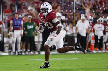 Oct 17, 2026; Stanford, California, USA;  Stanford Cardinal running back Micah Ford (20) runs with the ball during the second half against the Elon Phoenix at Stanford Stadium.  Mandatory Credit: Scott Marshall-Imagn Images
