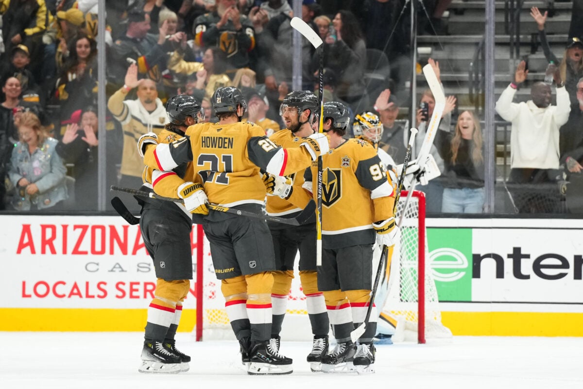 Oct 17, 2026; Las Vegas, Nevada, USA; Vegas Golden Knights defenseman Shea Theodore (27) celebrates his second-period goal with teammates during the game against the Pittsburgh Penguins at T-Mobile Arena. Mandatory Credit: Candice Ward-Imagn Images