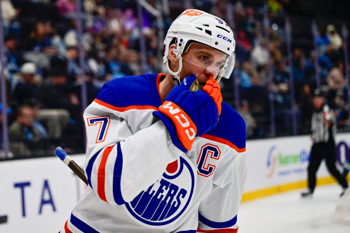 Oct 17, 2026; Salt Lake City, Utah, USA;  Edmonton Oilers center Connor McDavid (97) silences the crowd after his goal during third period against the Utah Mammoth at Delta Center.  Mandatory Credit: Peter Creveling-Imagn Images