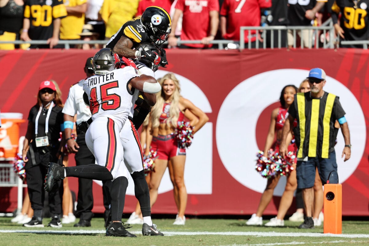 Oct 18, 2026; Tampa, Florida, USA; Pittsburgh Steelers running back Jaylen Warren (30) is tackled by Tampa Bay Buccaneers linebacker Josiah Trotter (45) during the fourth quarter at Raymond James Stadium. Mandatory Credit: Morgan Tencza-Imagn Images