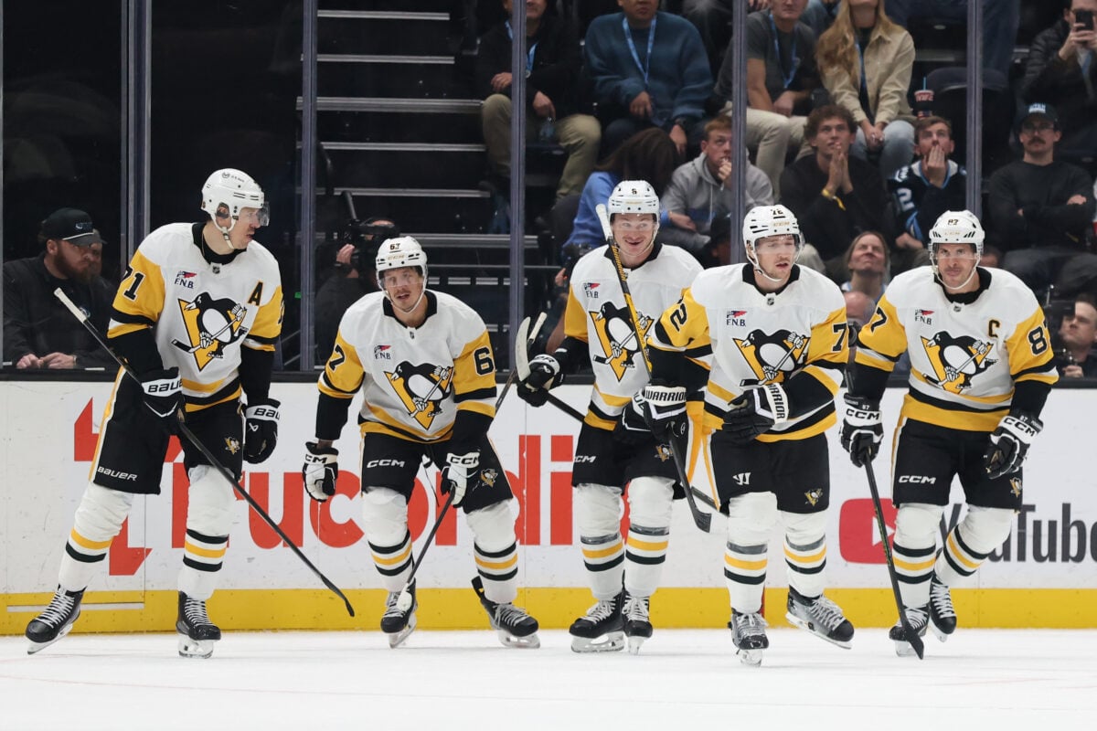 Oct 19, 2026; Salt Lake City, Utah, USA;  The Pittsburgh Penguins celebrate after a goal by defenseman Declan Carlile (72) during the third period against the Utah Mammoth at Delta Center.  Mandatory Credit: Rob Gray-Imagn Images