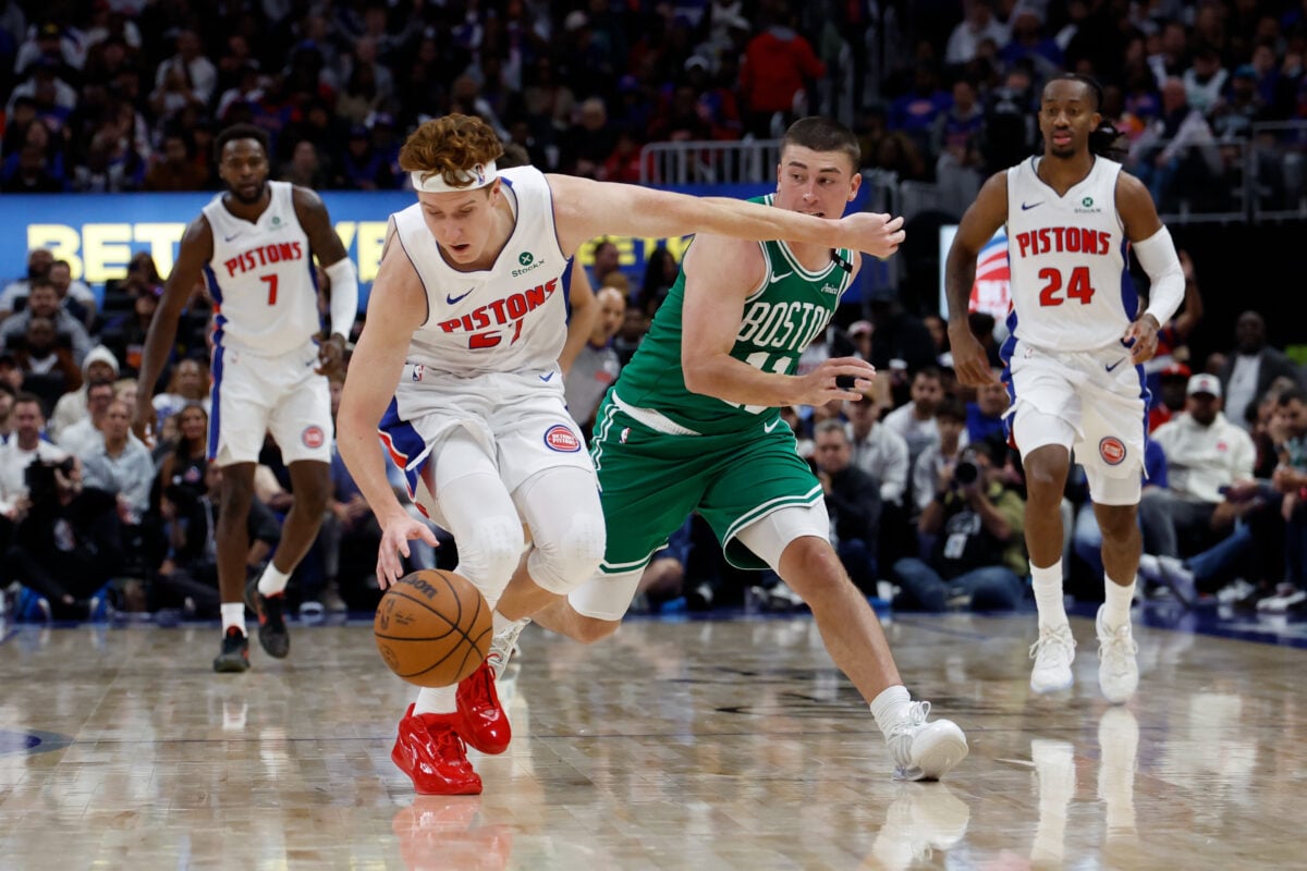 Oct 20, 2026; Detroit, Michigan, USA; Detroit Pistons guard-forward Kevin Huerter (27) dribbles defended by Boston Celtics guard Payton Pritchard (11) in the second half at Little Caesars Arena. Mandatory Credit: Rick Osentoski-Imagn Images