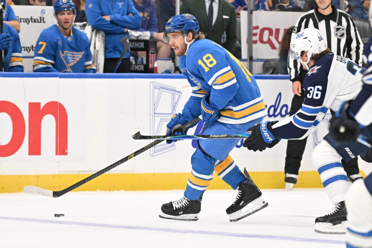 Oct 20, 2026; St. Louis, Missouri, USA;  St. Louis Blues center Robert Thomas (18) skates against Winnipeg Jets center Morgan Barron (36) during the second period at Enterprise Center.  Mandatory Credit: Jeff Le-Imagn Images