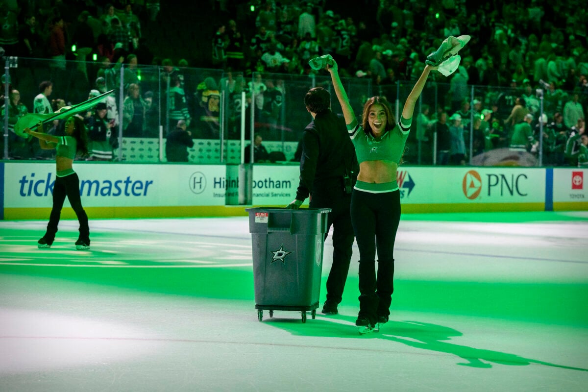 Oct 20, 2026; Dallas, Texas, USA; The Dallas Stars ice girls celebrate as they pick up hats off the ice following Dallas Stars right wing Mikko Rantanen (not pictured) game winning hat trick goal to defeat the Boston Bruins in overtime at the American Airlines Center. Mandatory Credit: Jerome Miron-Imagn Images