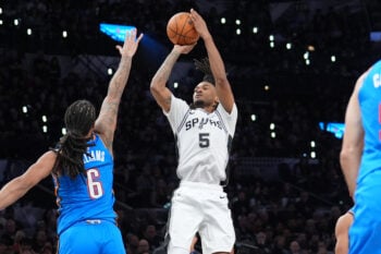 Oct 20, 2026; San Antonio, Texas, USA;  San Antonio Spurs guard Stephon Castle (5) shoots in front of Oklahoma City Thunder forward Jaylin Williams (6) in the second half at Frost Bank Center.  Mandatory Credit: Daniel Dunn-Imagn Images