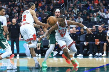 Oct 23, 2026; Milwaukee, WI, USA;  Chicago Bulls guard Isaac Okoro (35) battles for a loose ball against the Milwaukee Bucks during the fourth quarter at Fiserv Forum.  Mandatory Credit: Brad Repplinger-Imagn Images