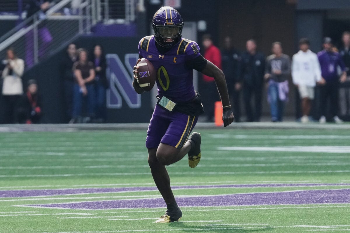 Oct 24, 2026; Evanston, Illinois, USA;  Northwestern Wildcats quarterback Aidan Chiles (0) runs with the ball against the Rutgers Scarlet Knights during the first half at New Ryan Field.  Mandatory Credit: David Banks-Imagn Images