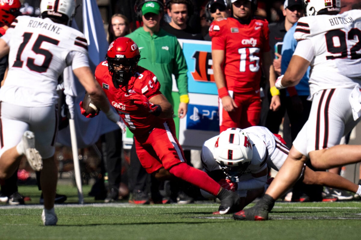 Texas Tech safety Brenden Jordan (7) tackles Cincinnati Bearcats running back Cole Tabb (3) in the third quarter of the Big 12 game between Cincinnati Bearcats and Texas Tech at Nippert Stadium in Cincinnati on Saturday, October 24, 2026.