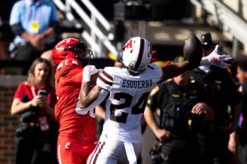 Texas Tech safety Malik Esquerra (24) knocks the ball away from Cincinnati Bearcats wide receiver Jalen Williams (80) in the fourth quarter of the Big 12 game between Cincinnati Bearcats and Texas Tech at Nippert Stadium in Cincinnati on Saturday, October 24, 2026.