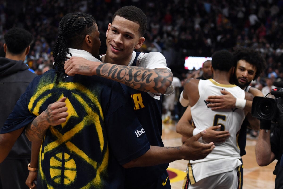 Oct 24, 2026; Denver, Colorado, USA; Denver Nuggets forward Trevon Brazile (7) celebrates with teammates after an overtime win against the New Orleans Pelicans at Ball Arena. Mandatory Credit: Christopher Hanewinckel-Imagn Images