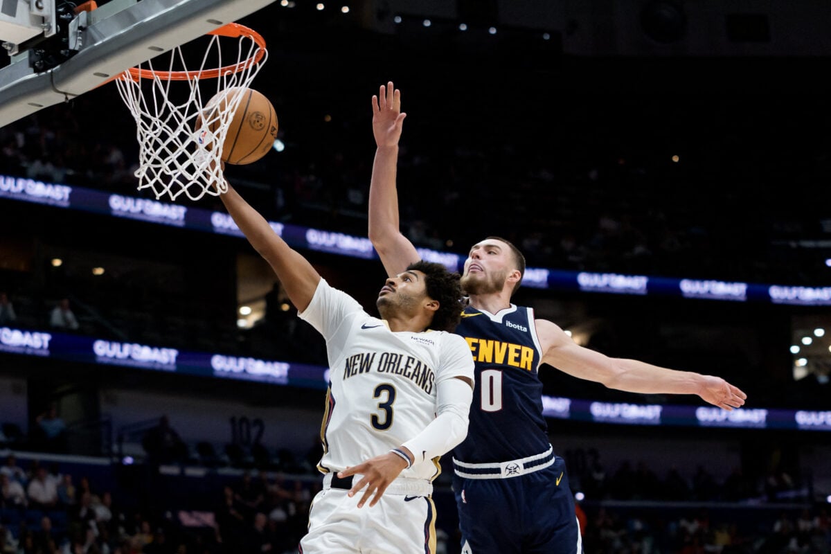 Oct 28, 2026; New Orleans, Louisiana, USA; New Orleans Pelicans guard Jordan Poole (3) shoots against Denver Nuggets guard Christian Braun (0) during the first half at Smoothie King Center. Mandatory Credit: Matthew Hinton-Imagn Images