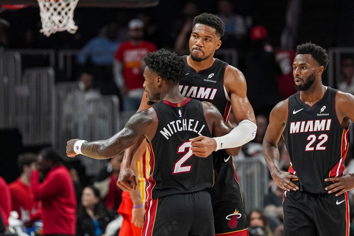 Oct 28, 2026; Atlanta, Georgia, USA; Miami Heat forward Giannis Antetokounmpo (7) and guard Davion Mitchell (2) react at the end of the game against the Atlanta Hawks at State Farm Arena. Mandatory Credit: Dale Zanine-Imagn Images
