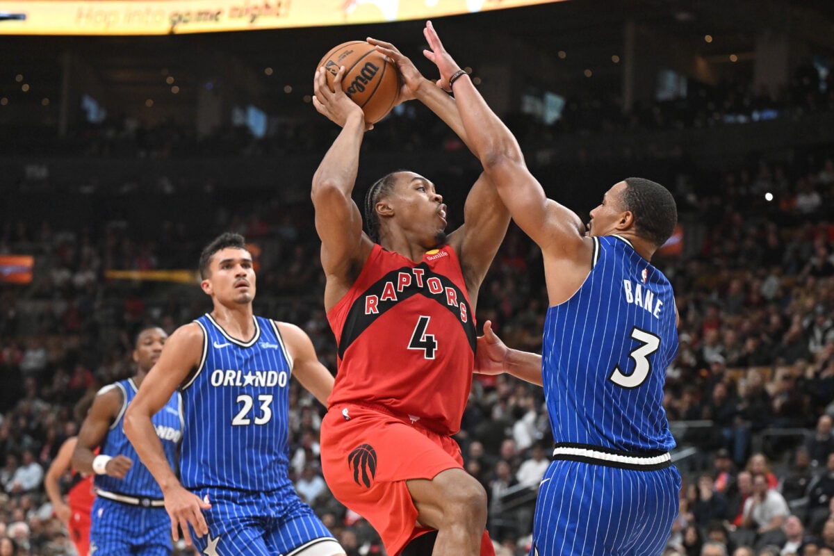 Oct 28, 2026; Toronto, Ontario, CAN; Toronto Raptors forward Scottie Barnes (4) drives to the basket against Orlando Magic forward Desmond Bane (3) in the second half at Scotiabank Arena. Mandatory Credit: Dan Hamilton-Imagn Images