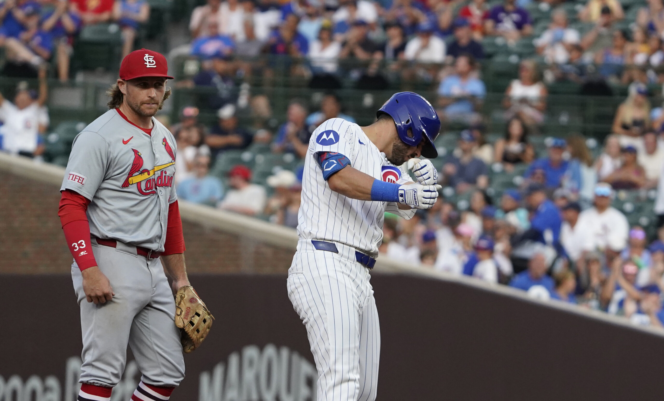 Aug 4, 2024; Chicago, Illinois, USA; Chicago Cubs outfielder Mike Tauchman (40) gestures after hitting a double against the St. Louis Cardinals during the fourth inning at Wrigley Field. Mandatory Credit: David Banks-Imagn Images