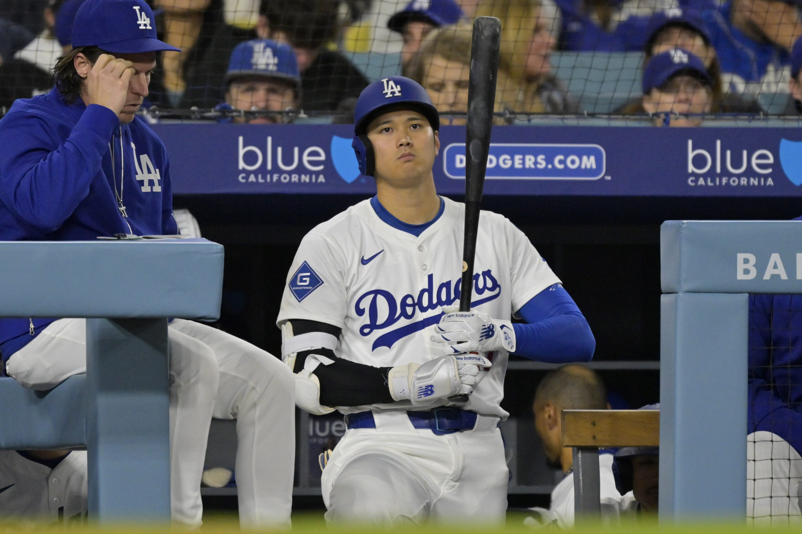 Apr 16, 2025; Los Angeles, California, USA; Los Angeles Dodgers designated hitter Shohei Ohtani (17) looks on from the dugout in the third inning against the Colorado Rockies at Dodger Stadium. Mandatory Credit: Jayne Kamin-Oncea-Imagn Images