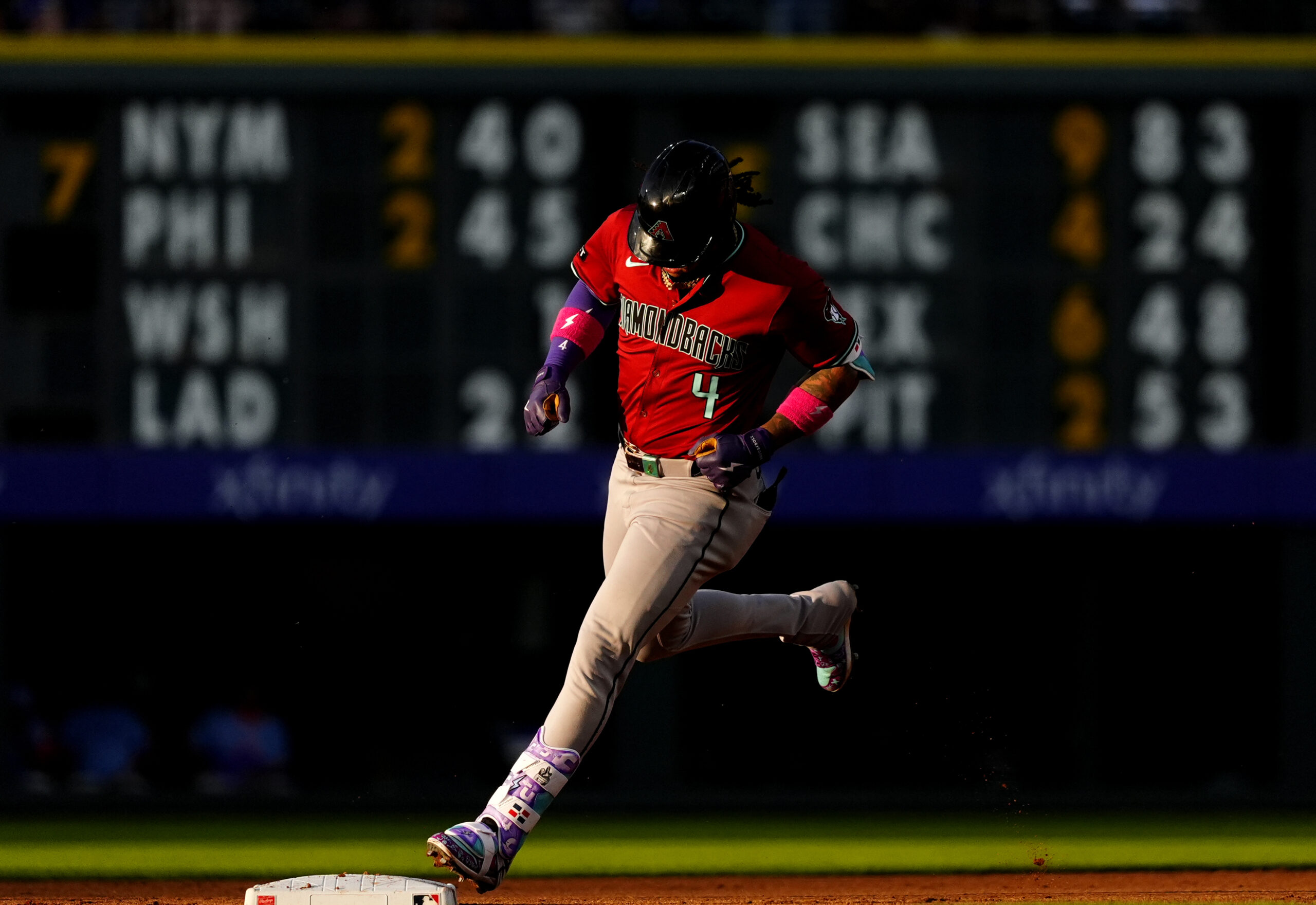 Jun 20, 2025; Denver, Colorado, USA; Arizona Diamondbacks designated hitter Ketel Marte (4) runs off a three run home run in the fourth inning against the Colorado Rockies at Coors Field. Mandatory Credit: Ron Chenoy-Imagn Images