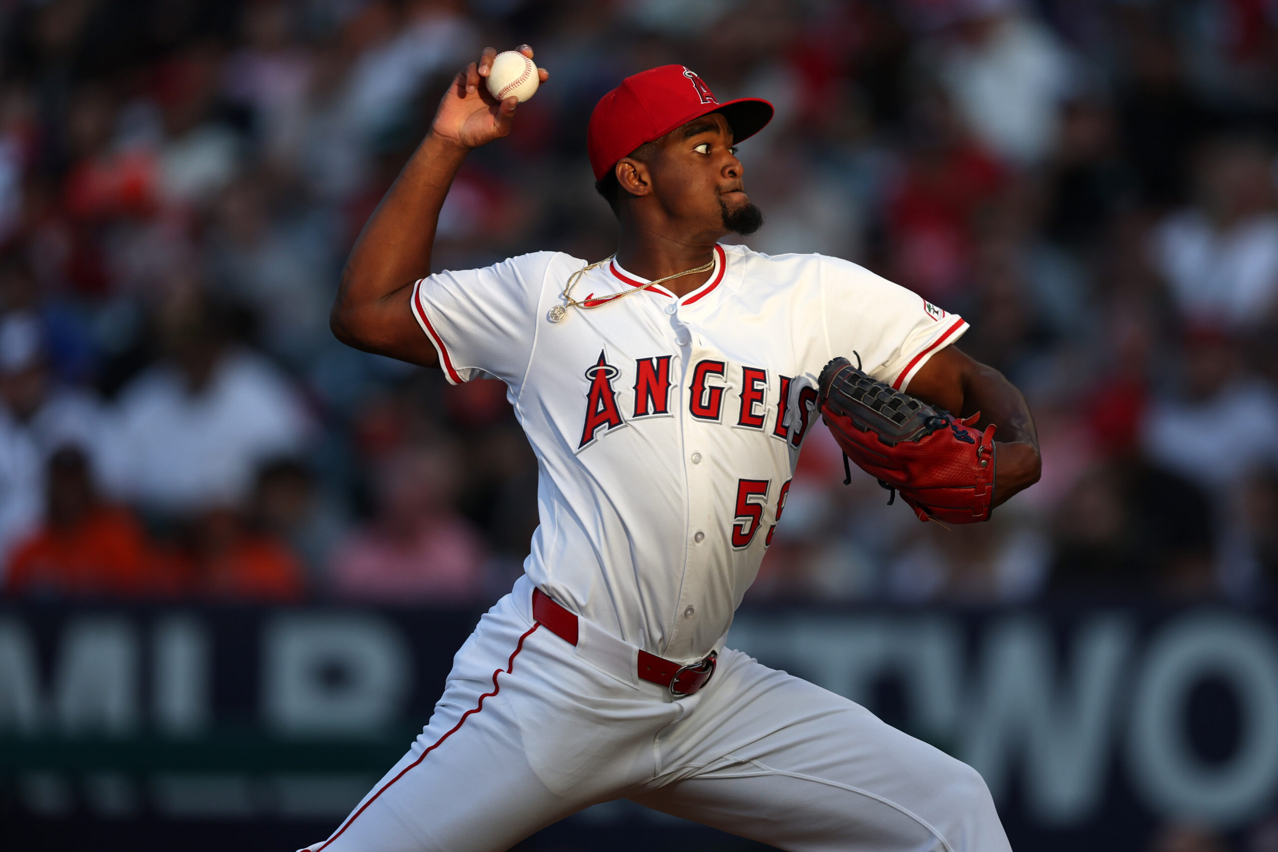 Jun 21, 2025; Anaheim, California, USA; Los Angeles Angels starting pitcher Jose Soriano (59) pitches during the third inning against the Houston Astros at Angel Stadium. Mandatory Credit: Kiyoshi Mio-Imagn Images
