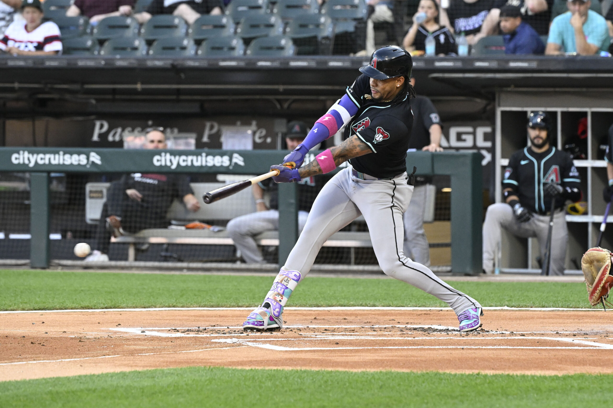 Jun 23, 2025; Chicago, Illinois, USA;  Arizona Diamondbacks second baseman Ketel Marte (4) singles against the Chicago White Sox during the first inning at Rate Field. Mandatory Credit: Matt Marton-Imagn Images