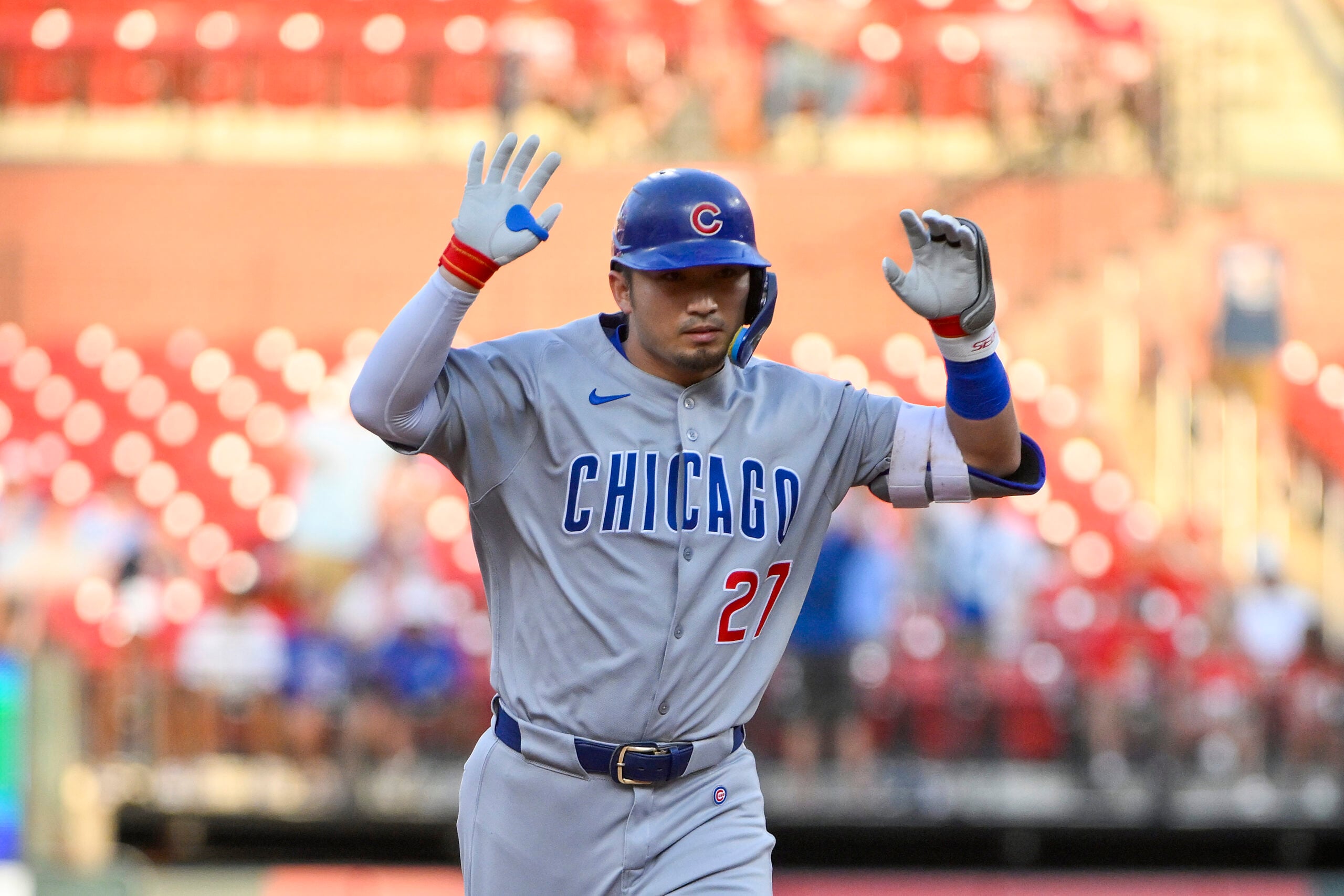 Jun 24, 2025; St. Louis, Missouri, USA;  Chicago Cubs left fielder Seiya Suzuki (27) reacts as he runs the bases after hitting a three run home run against the St. Louis Cardinals during the third inning at Busch Stadium. Mandatory Credit: Jeff Curry-Imagn Images