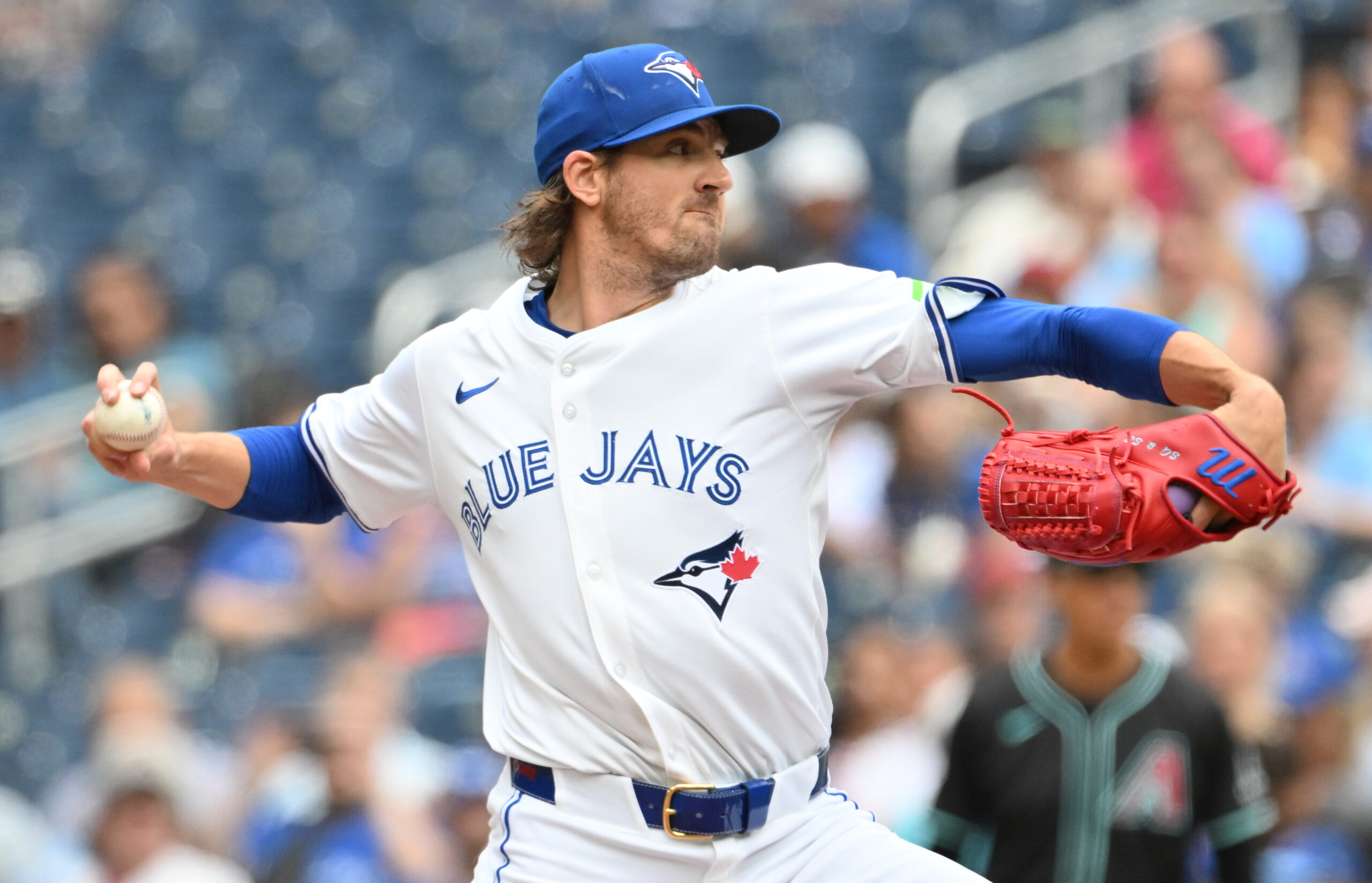 Jun 19, 2025; Toronto, Ontario, CAN;  Toronto Blue Jays starting pitcher Kevin Gausman (34) delivers a pitch against the Arizona Diamondbacks in the first inning at Rogers Centre. Mandatory Credit: Dan Hamilton-Imagn Images