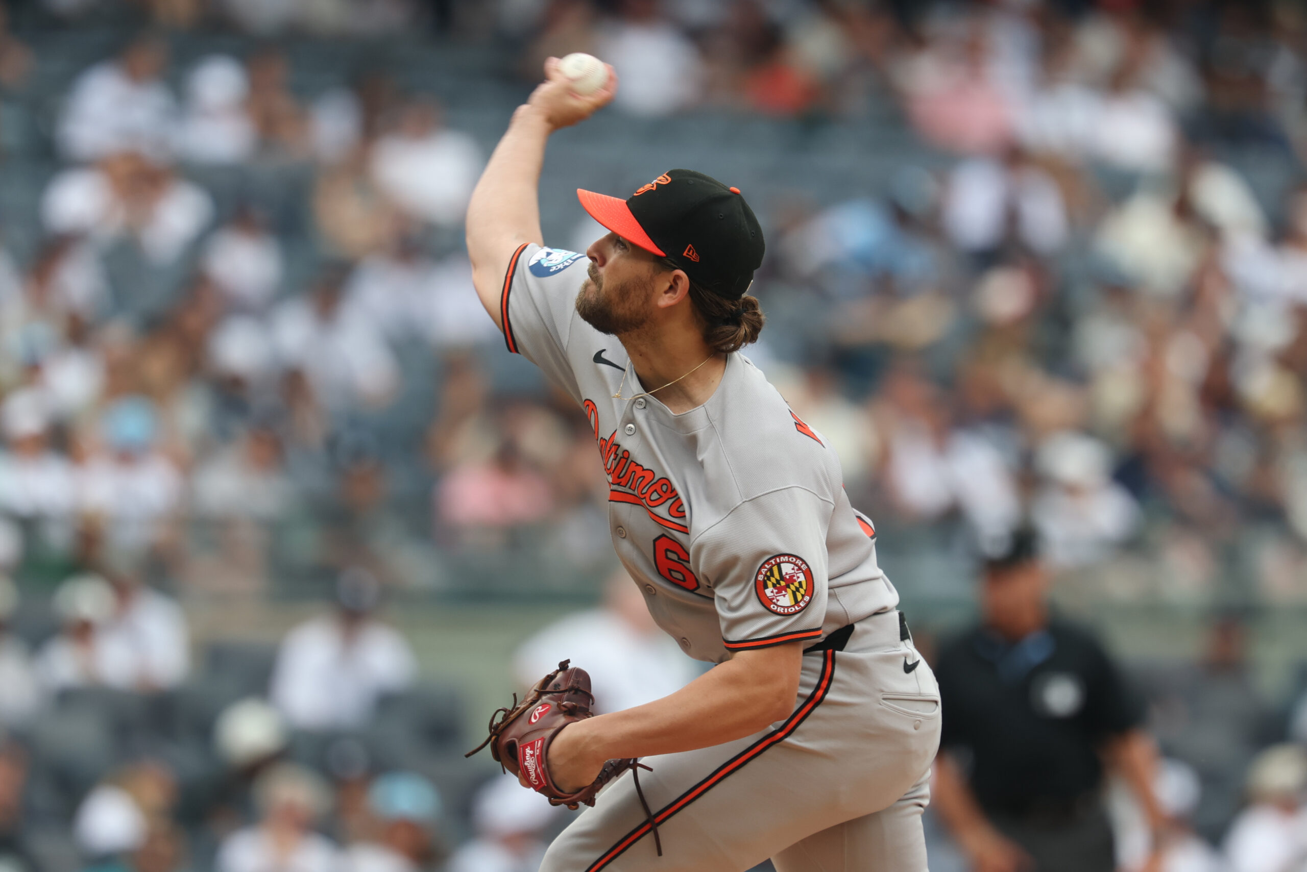 Jun 22, 2025; Bronx, New York, USA; Baltimore Orioles starting pitcher Dean Kremer (64) delivers a pitch during the first inning against the New York Yankees at Yankee Stadium. Mandatory Credit: Vincent Carchietta-Imagn Images