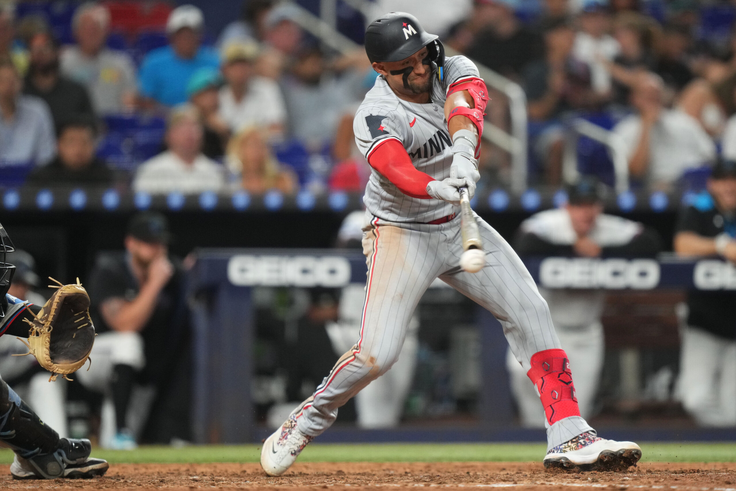Jul 1, 2025; Miami, Florida, USA;  Minnesota Twins third baseman Royce Lewis (23) strikes out in the eighth inning against the Miami Marlins at loanDepot Park. Mandatory Credit: Jim Rassol-Imagn Images