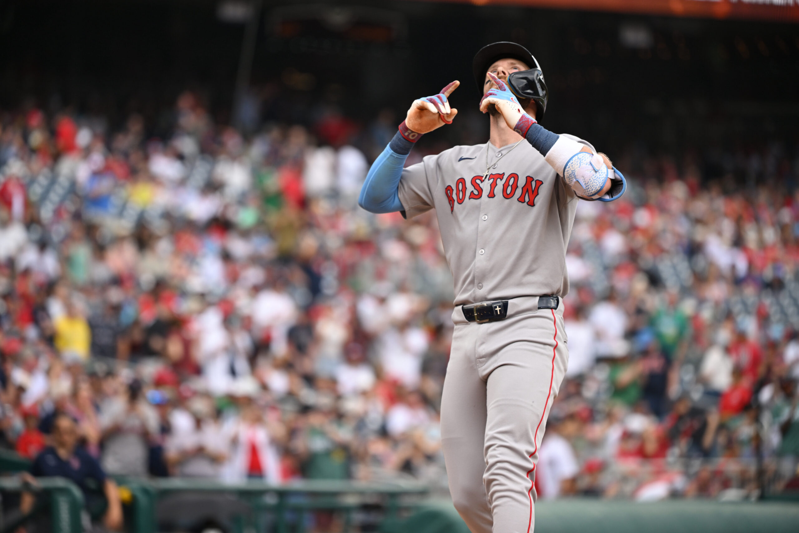 Jul 6, 2025; Washington, District of Columbia, USA; Boston Red Sox shortstop Trevor Story (10) points to the sky after hitting a two run home run against the Washington Nationals during the first inning at Nationals Park. Mandatory Credit: Rafael Suanes-Imagn Images