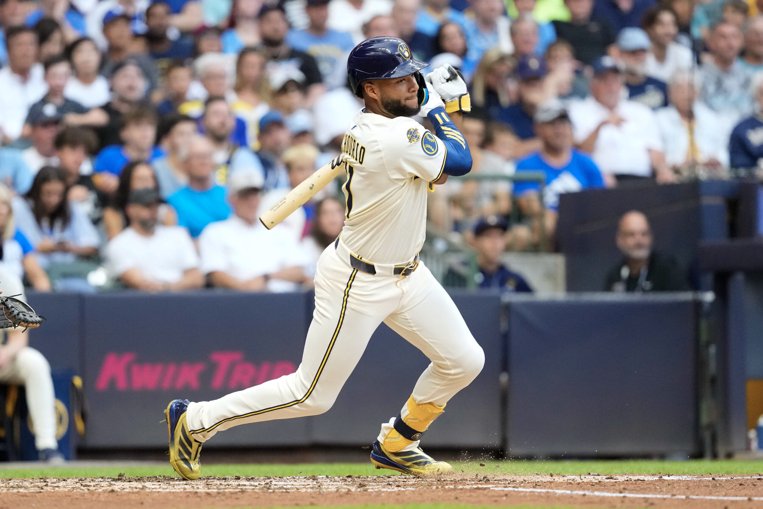Jul 8, 2025; Milwaukee, Wisconsin, USA;  Milwaukee Brewers center fielder Jackson Chourio (11) bats during the game against the Los Angeles Dodgers at American Family Field. Mandatory Credit: Jeff Hanisch-Imagn Images