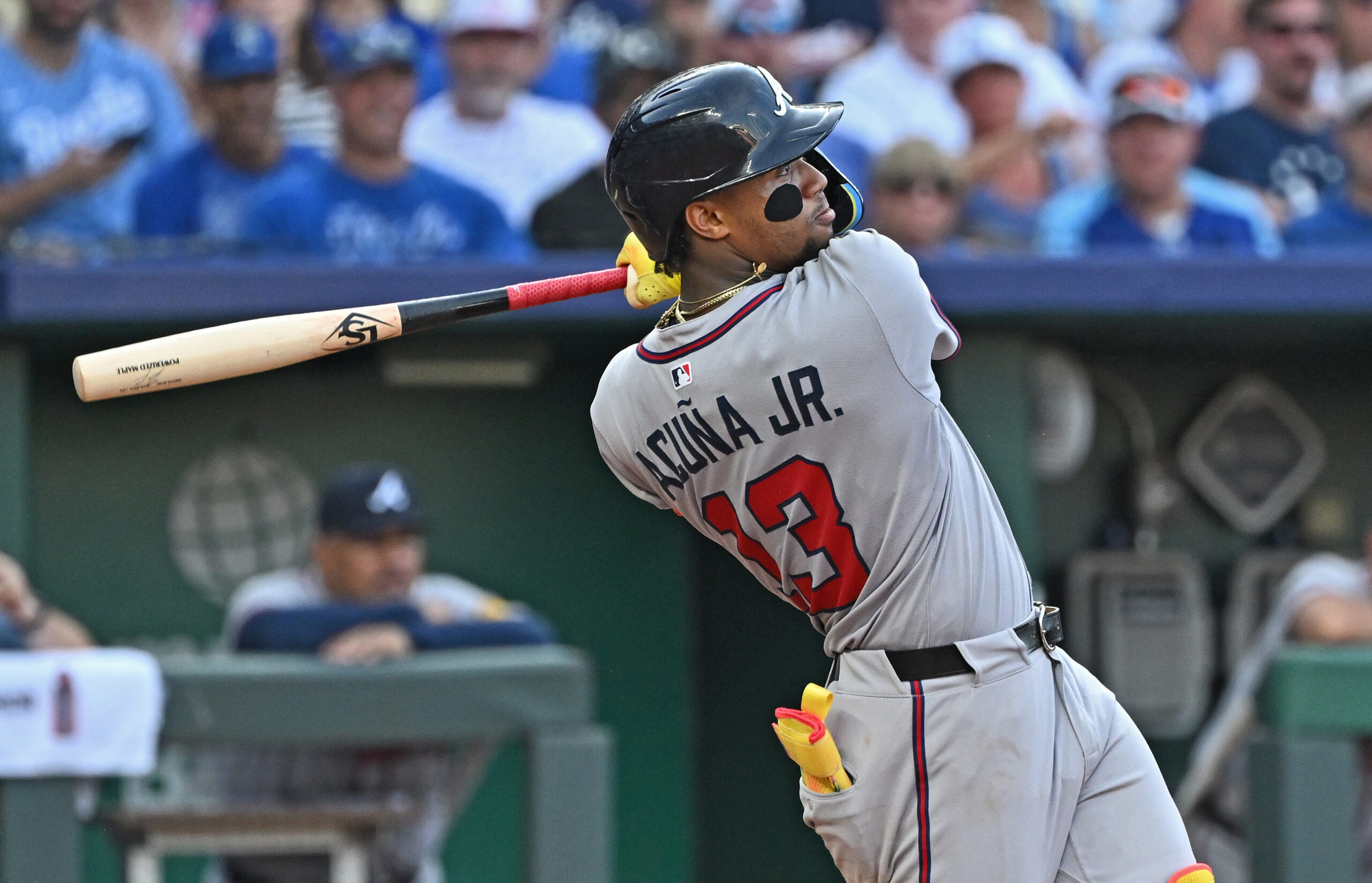Jul 28, 2025; Kansas City, Missouri, USA;  Atlanta Braves right fielder Ronald Acuna Jr. (13) hits a two-run home run in the third inning against the Kansas City Royals at Kauffman Stadium. Mandatory Credit: Peter Aiken-Imagn Images