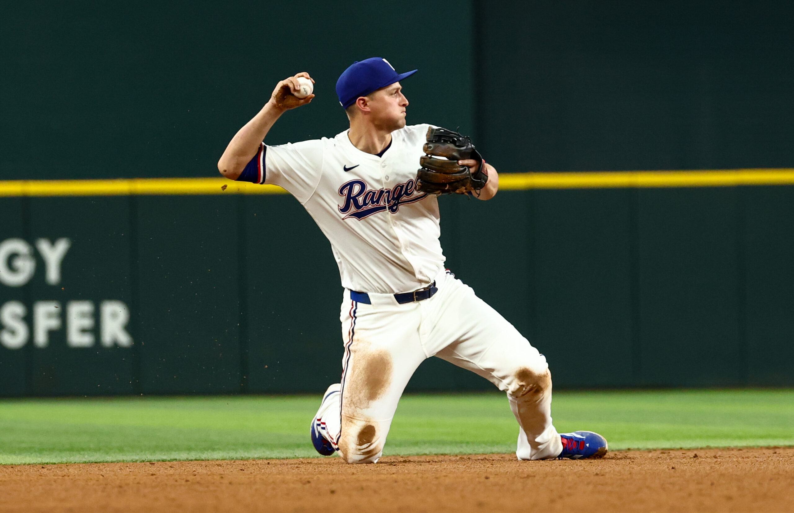 Aug 5, 2025; Arlington, Texas, USA;  Texas Rangers shortstop Corey Seager (5) makes a diving stop to start a double play during the ninth inning against the New York Yankees at Globe Life Field. Mandatory Credit: Kevin Jairaj-Imagn Images