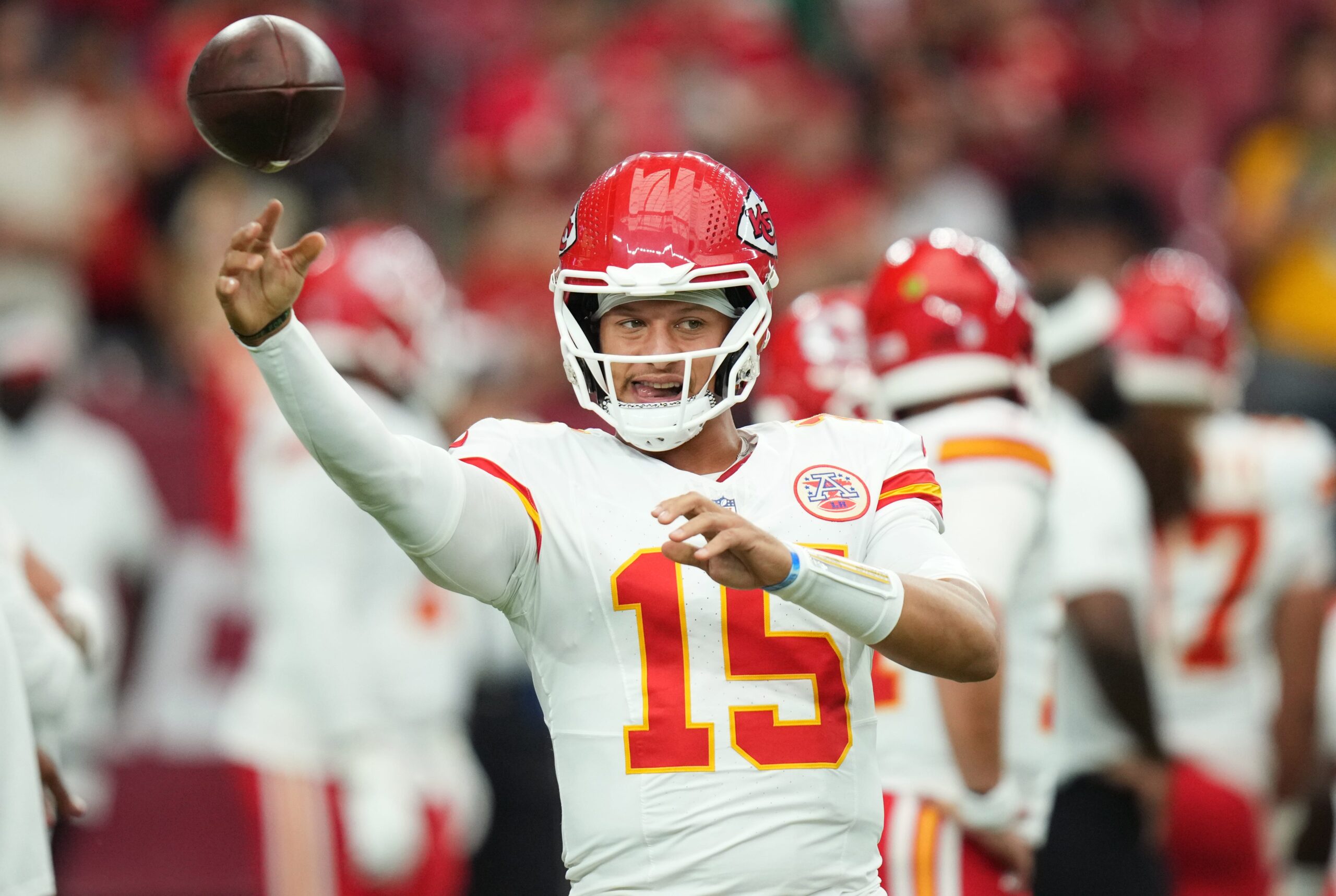 Kansas City Chiefs quarterback Patrick Mahomes (15) warms up before their preseason game against the Arizona Cardinals at State Farm Stadium on Aug. 9, 2025.