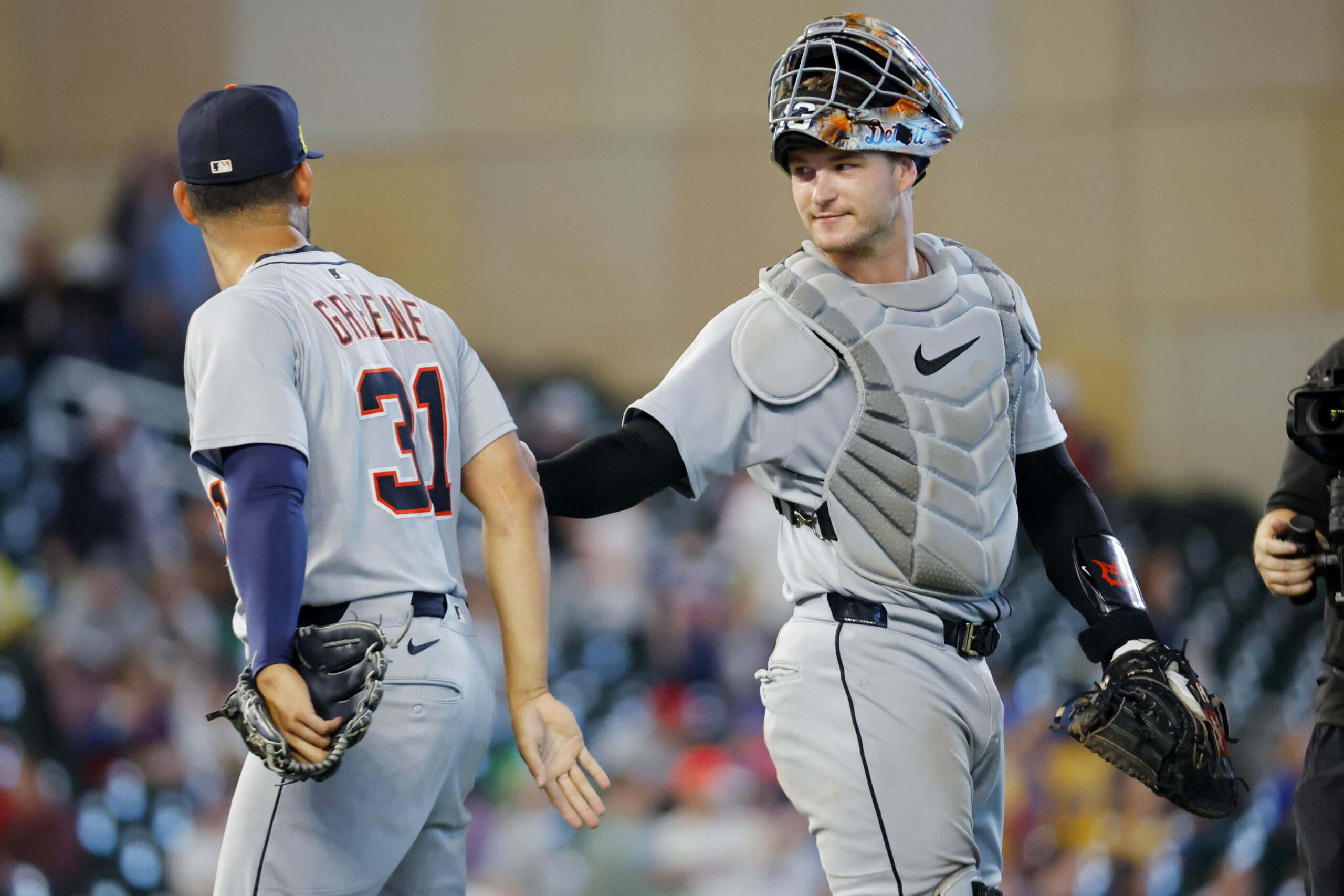 Aug 15, 2025; Minneapolis, Minnesota, USA; Detroit Tigers catcher Dillon Dingler (13) and left fielder Riley Greene (31) celebrate the win over the Minnesota Twins at Target Field. Mandatory Credit: Bruce Kluckhohn-Imagn Images