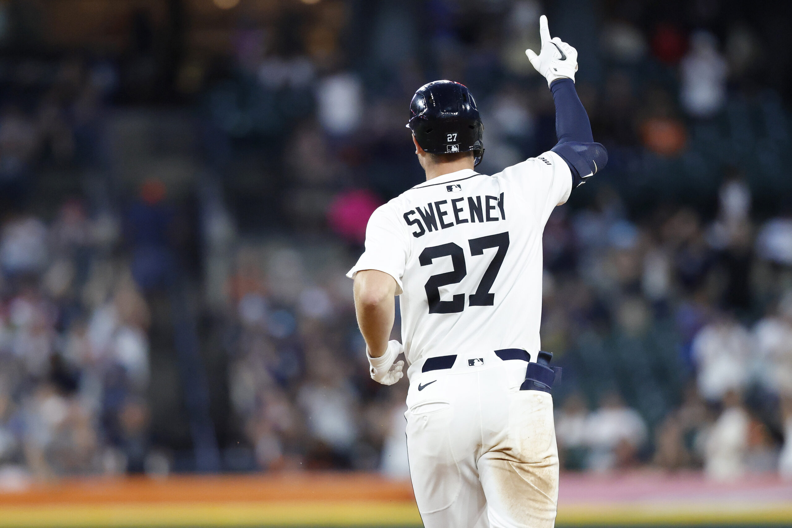 Aug 18, 2025; Detroit, Michigan, USA;  Detroit Tigers shortstop Trey Sweeney (27) celebrates after hitting a three run home run in the seventh inning against the Houston Astros at Comerica Park. Mandatory Credit: Rick Osentoski-Imagn Images