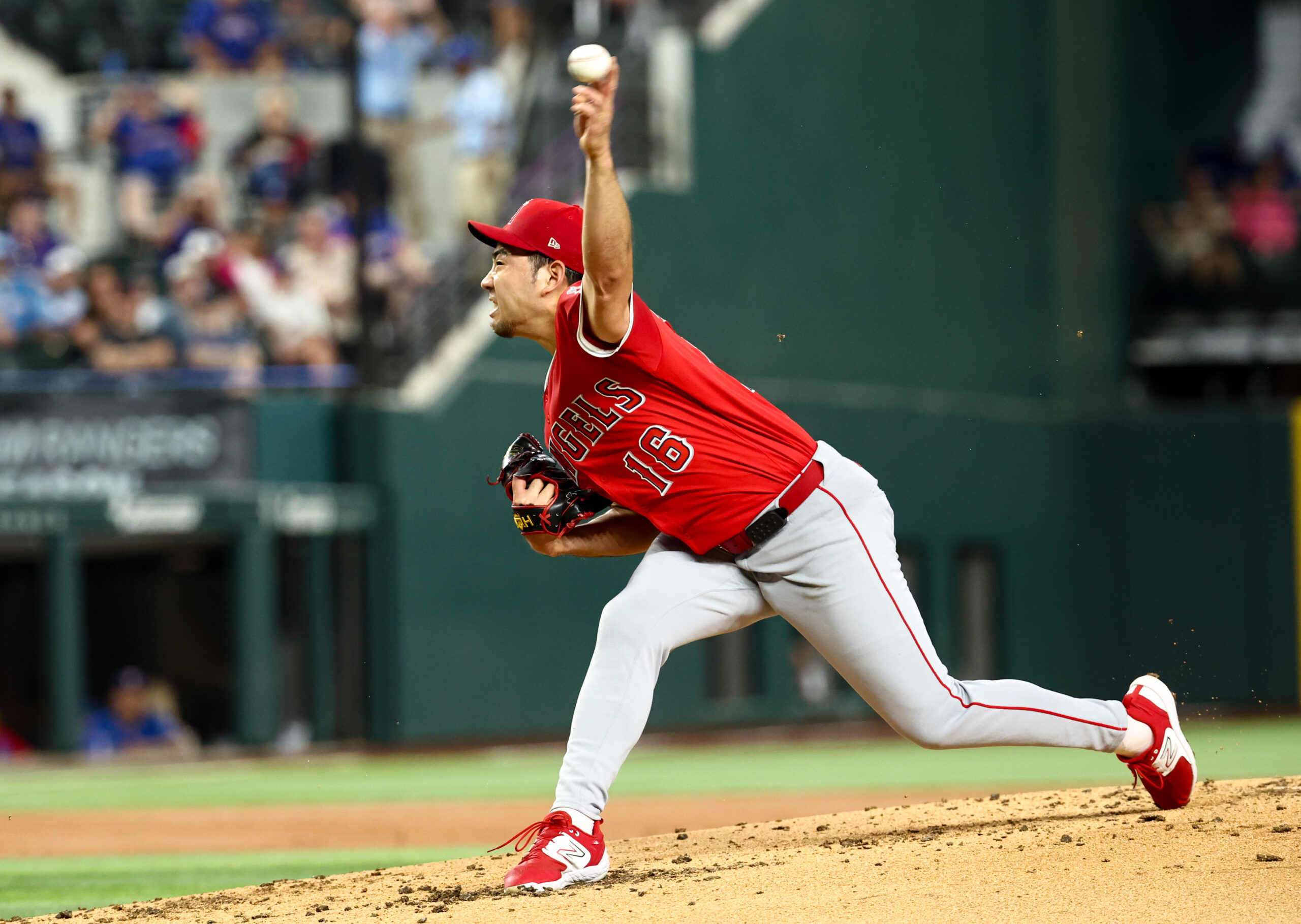 Aug 26, 2025; Arlington, Texas, USA; Los Angeles Angels starting pitcher Yusei Kikuchi (16) throws during the first inning against the Texas Rangers at Globe Life Field. Mandatory Credit: Kevin Jairaj-Imagn Images