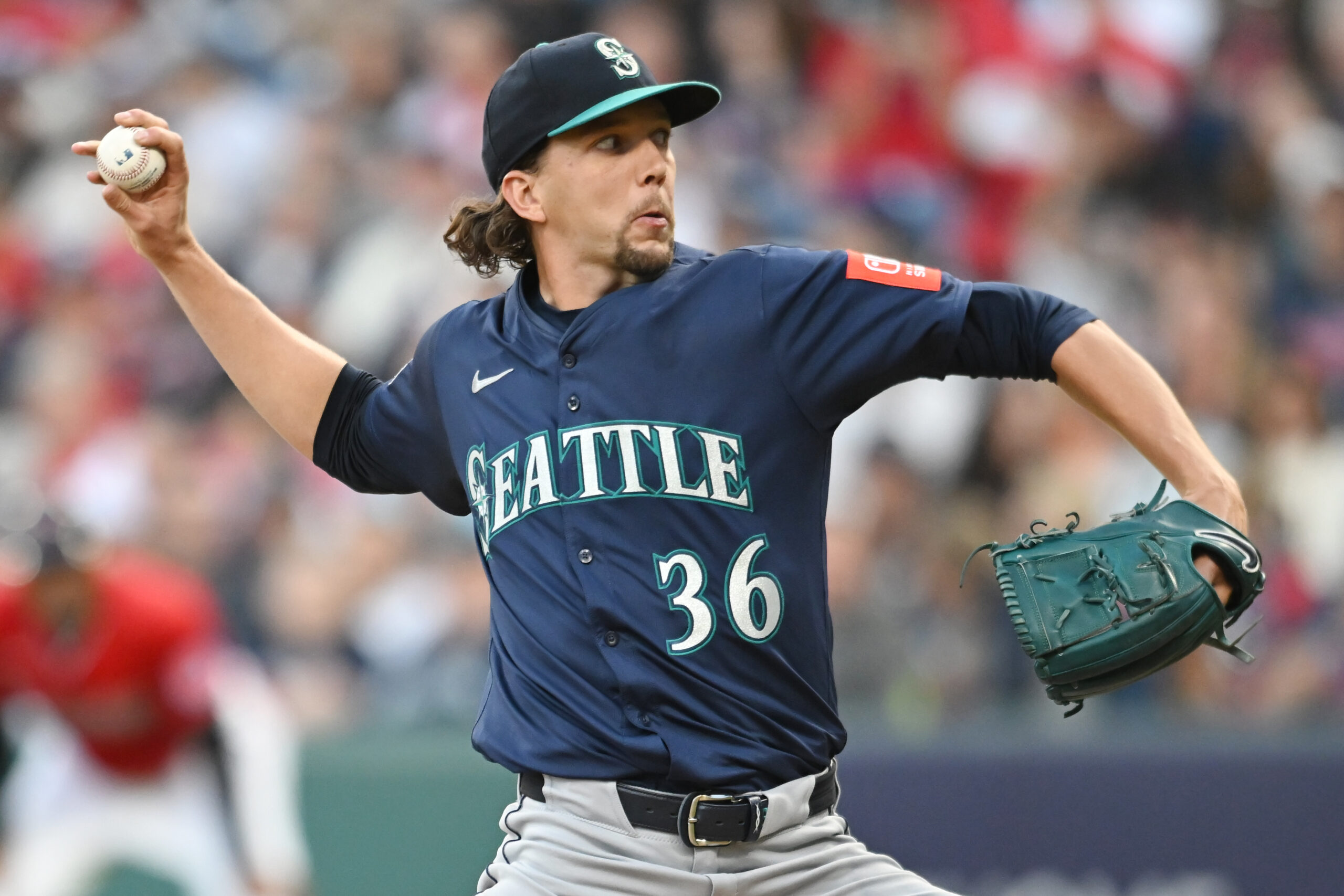 Aug 30, 2025; Cleveland, Ohio, USA; Seattle Mariners starting pitcher Logan Gilbert (36) throws a pitch against the Cleveland Guardians during the first inning at Progressive Field. Mandatory Credit: Ken Blaze-Imagn Images