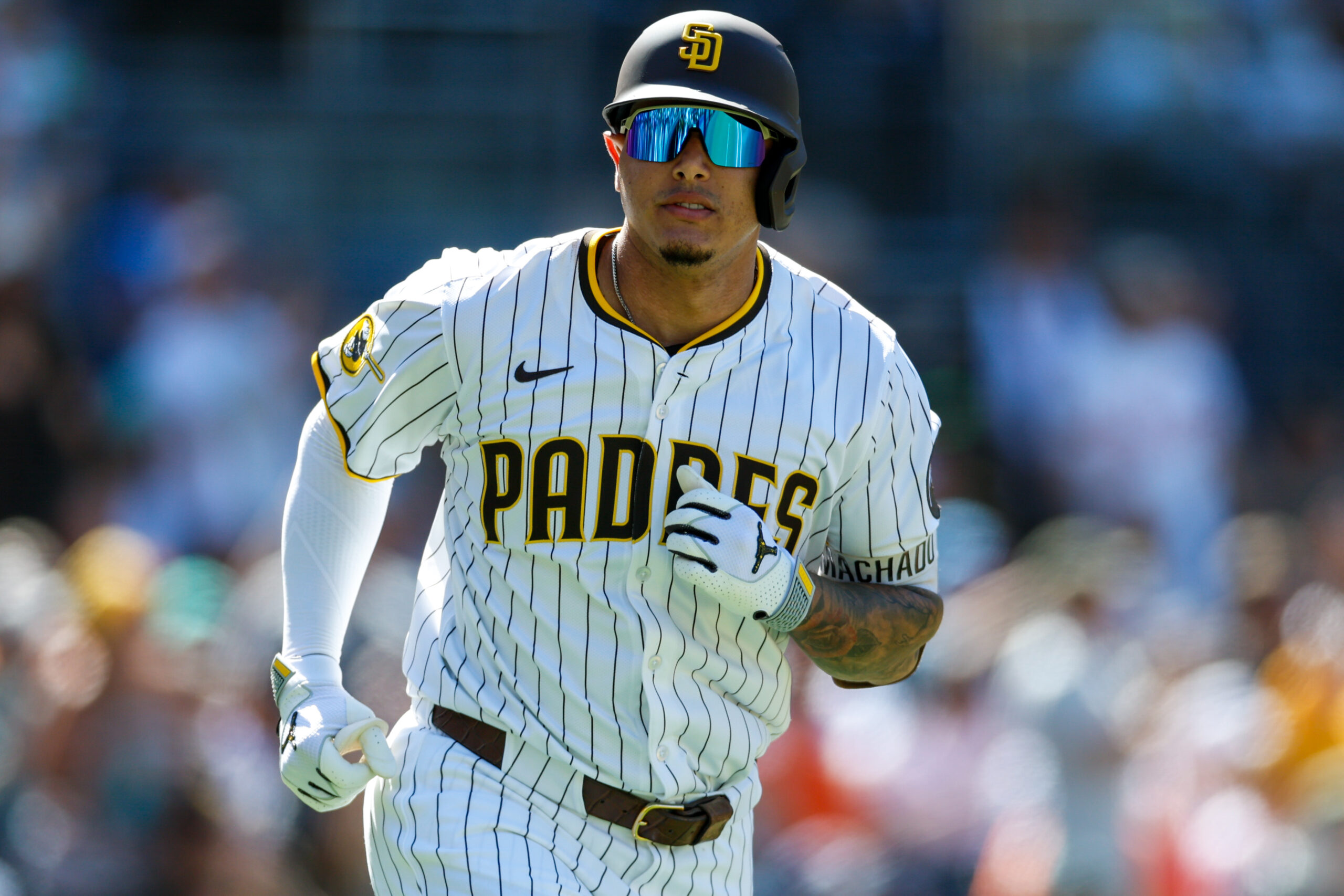Sep 3, 2025; San Diego, California, USA; San Diego Padres third baseman Manny Machado (13) looks into the dugout after hitting a two-run home run during the sixth inning against the Baltimore Orioles at Petco Park. Mandatory Credit: David Frerker-Imagn Images