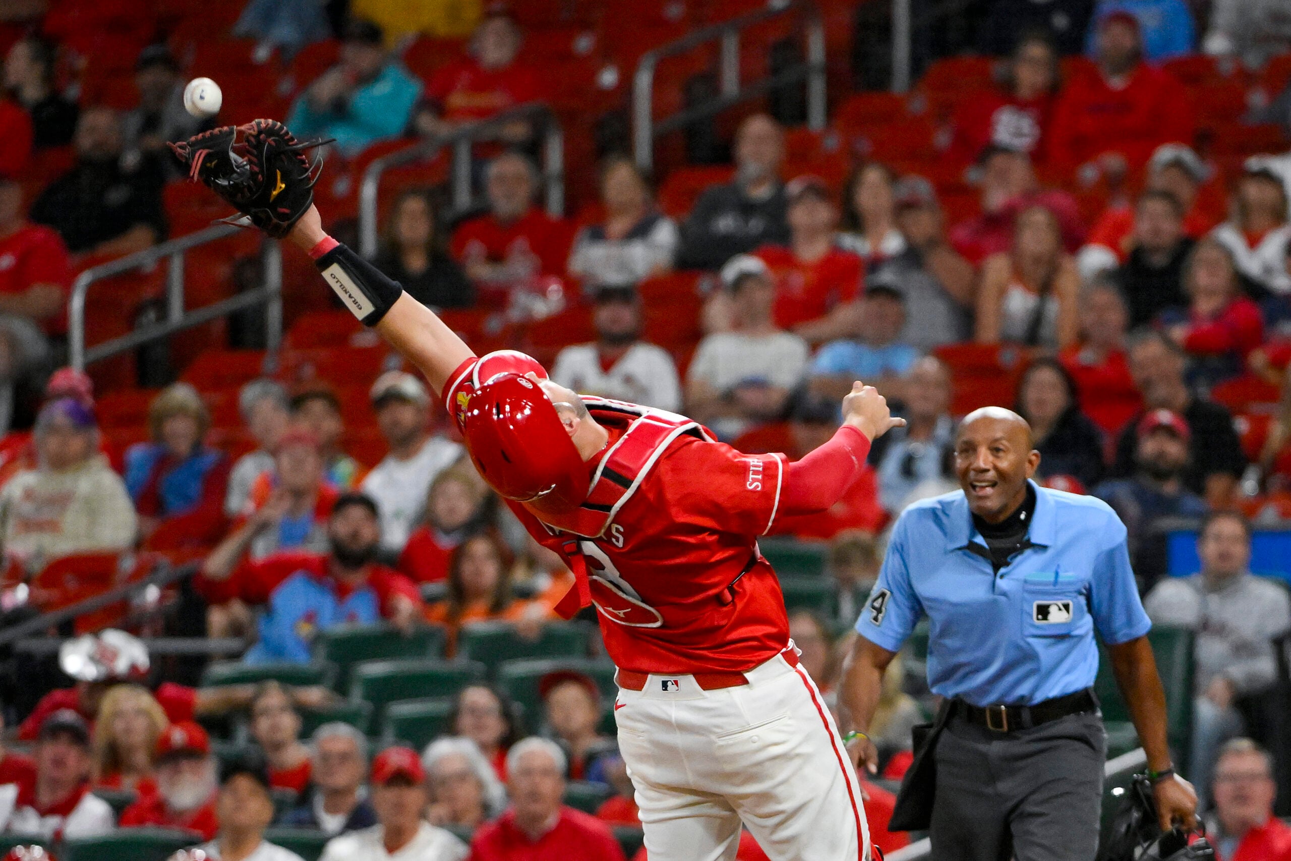 Sep 5, 2025; St. Louis, Missouri, USA;  St. Louis Cardinals catcher Jimmy Crooks (8) catches a pop up hit by San Francisco Giants left fielder Heliot Ramos (not pictured) during the ninth inning at Busch Stadium. Mandatory Credit: Jeff Curry-Imagn Images