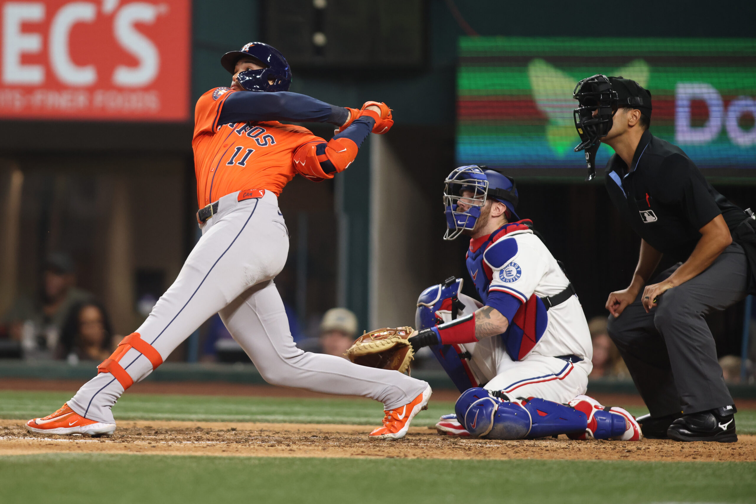 Sep 6, 2025; Arlington, Texas, USA; Houston Astros pinch hitter Cam Smith (11) hits a triple during the eighth inning against the Texas Rangers at Globe Life Field. Mandatory Credit: Tim Heitman-Imagn Images