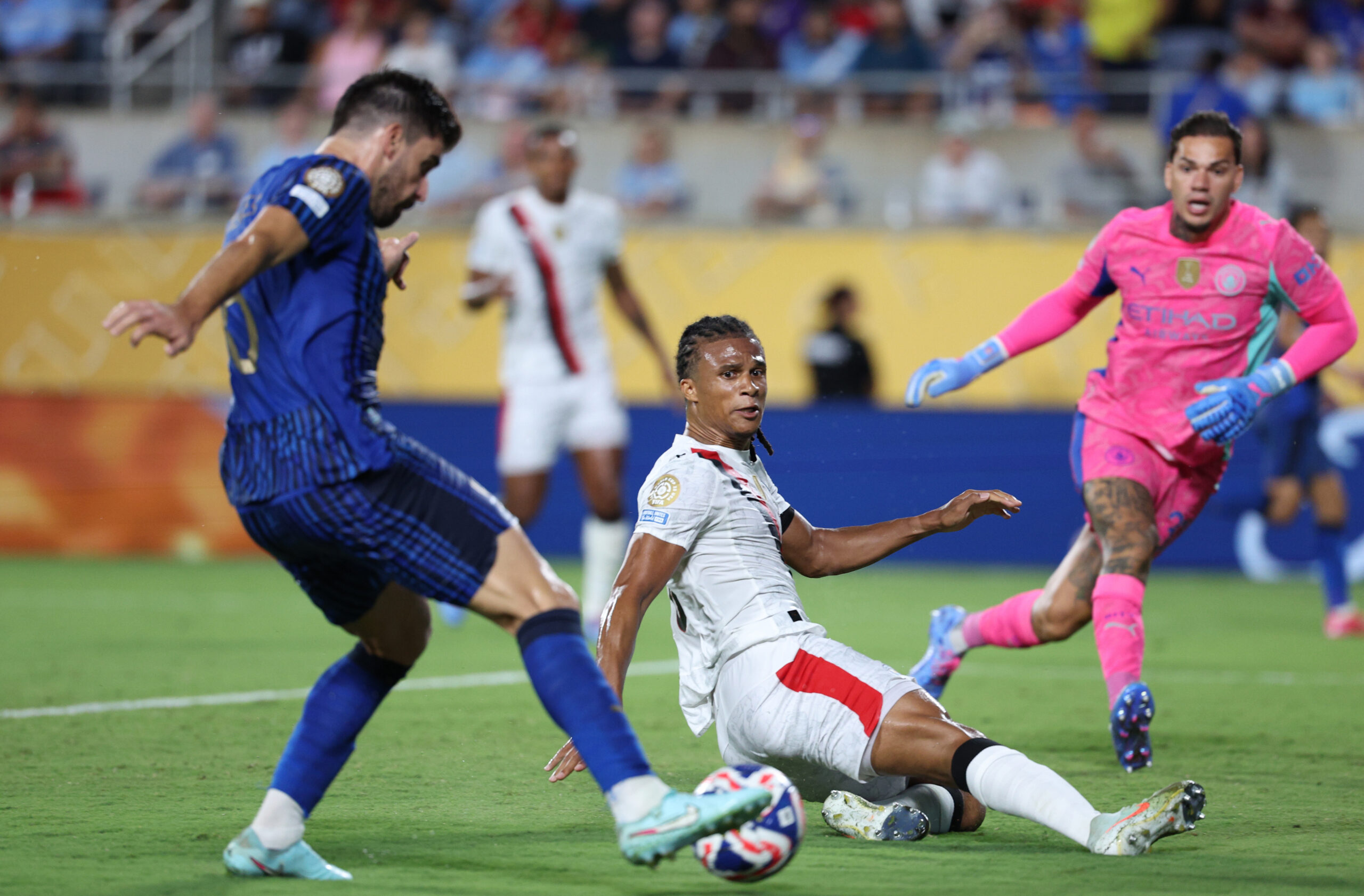 Jun 30, 2025; Orlando, Florida, USA; Manchester City defender Nathan Ake (6) blocks a shot by Al Hilal FC midfielder Ruben Neves (8) in extra time during a round of 16 match of the 2025 FIFA Club World Cup at Camping World Stadium. Mandatory Credit: Nathan Ray Seebeck-Imagn Images