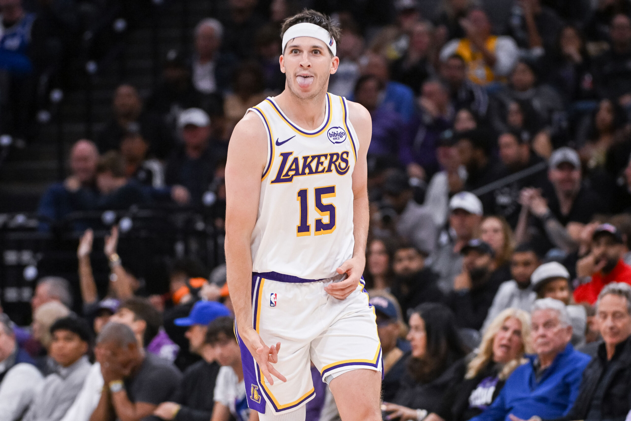 Oct 26, 2025; Sacramento, California, USA; Los Angeles Lakers guard Austin Reaves (15) reacts after making a three point shot against the Sacramento Kings during the fourth quarter at Golden 1 Center. Mandatory Credit: Ed Szczepanski-Imagn Images