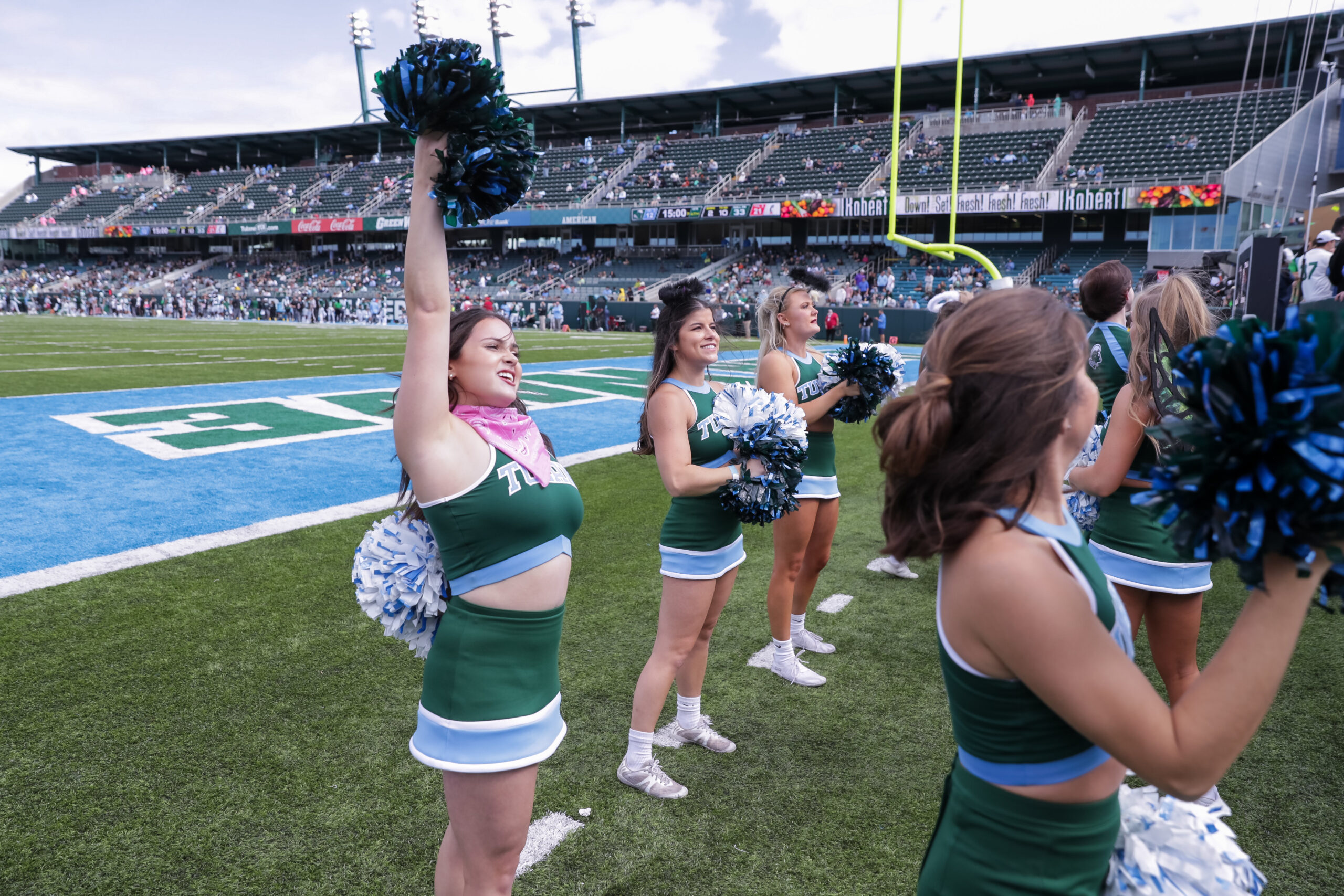 Oct 30, 2021; New Orleans, Louisiana, USA;  Tulane Green Wave cheerleaders entertain the fans against Cincinnati Bearcats during the second half at Yulman Stadium. Mandatory Credit: Stephen Lew-Imagn Images