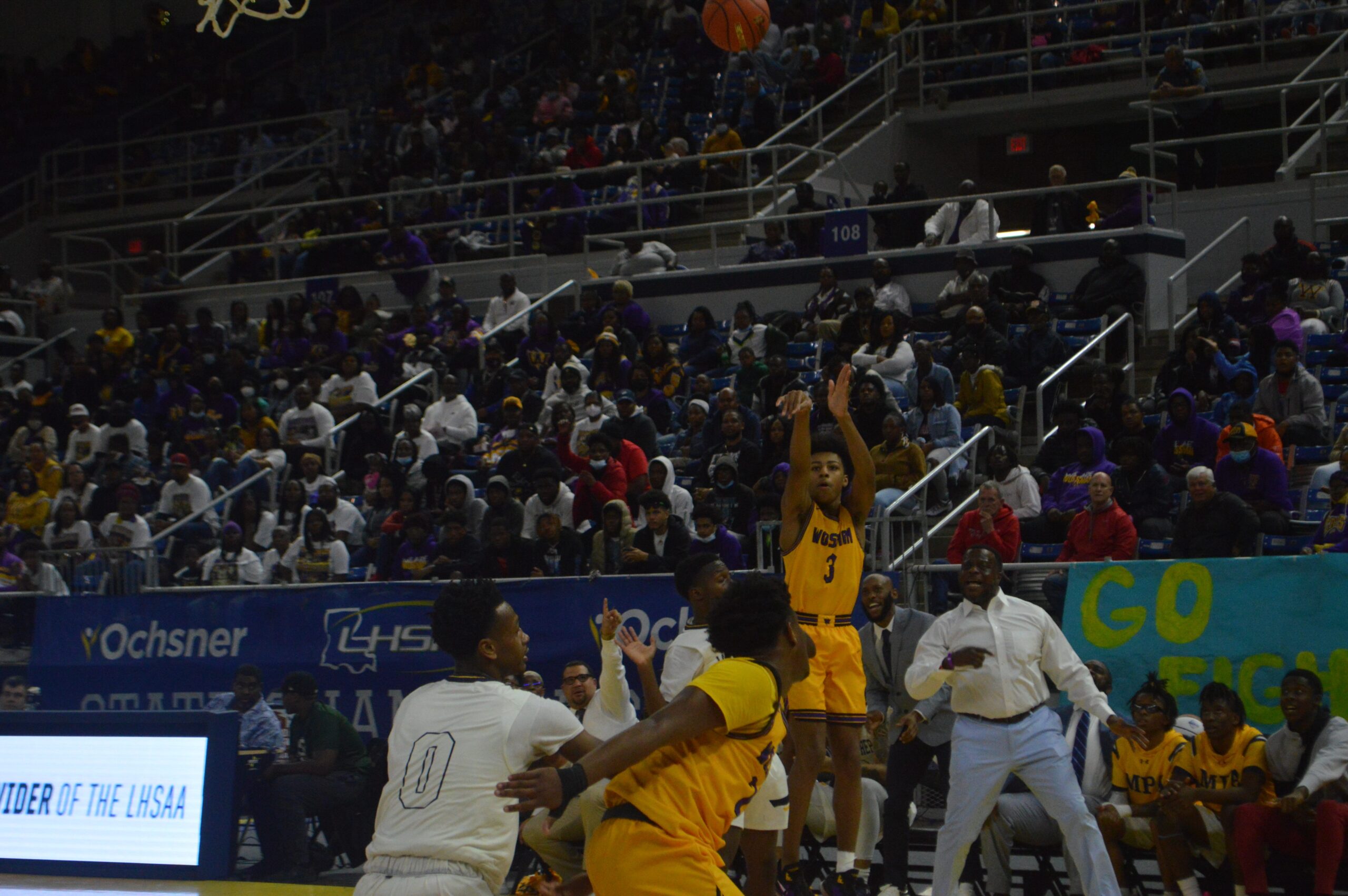Wossman's Krystian Lewis (3) attempts a 3-pointer during the Class 3A finals Saturday.

Dsc 0659