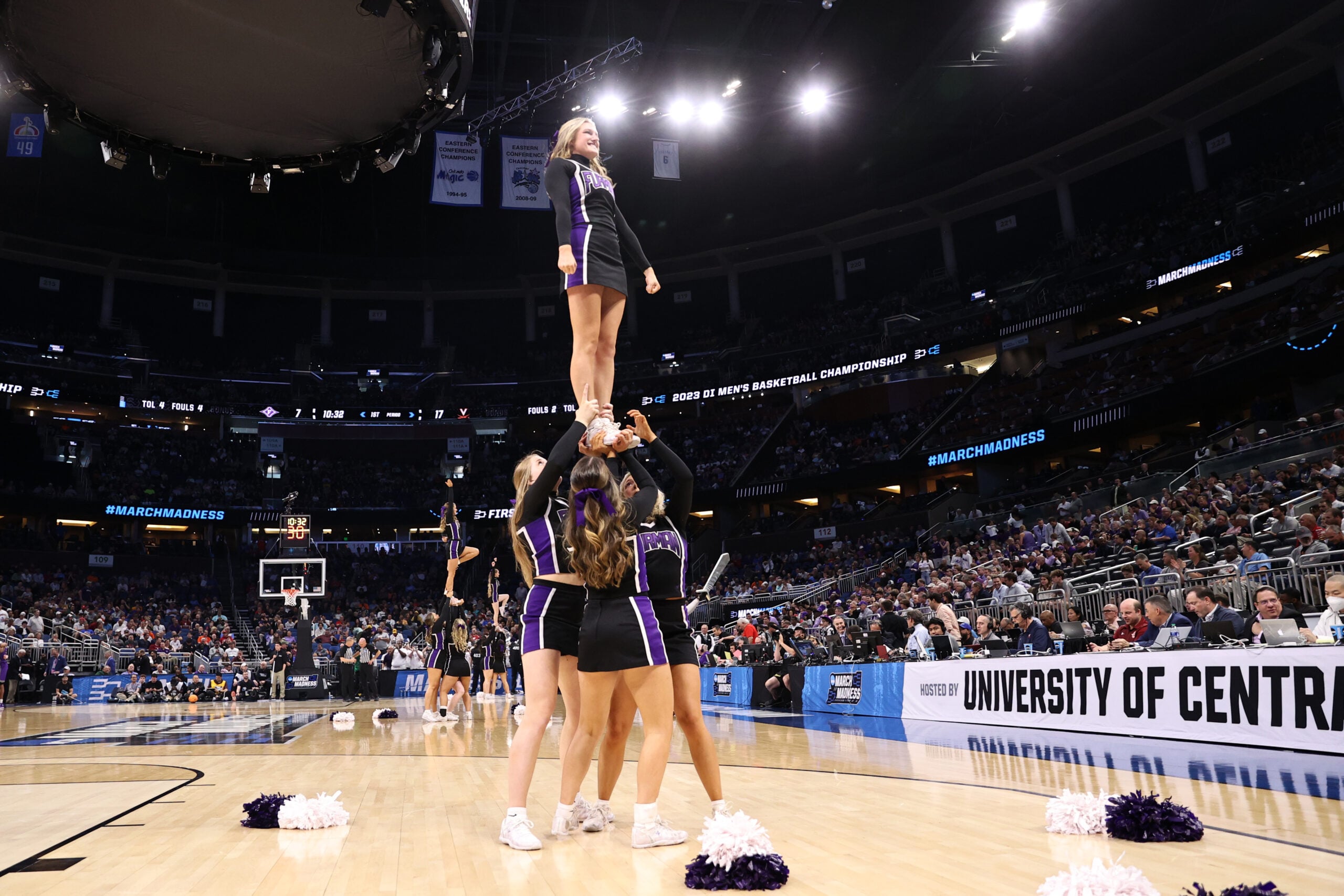 Mar 16, 2023; Orlando, FL, USA; Furman Paladins cheerleaders perform during the first half against the Virginia Cavaliers at Amway Center. Mandatory Credit: Matt Pendleton-Imagn Images