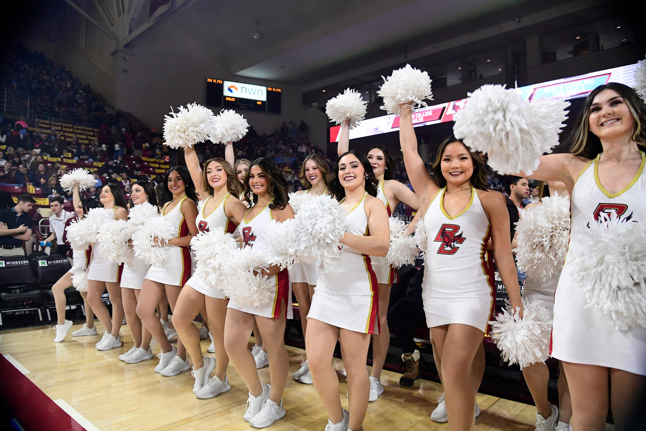 Jan 20, 2024; Chestnut Hill, Massachusetts, USA; The Boston College Eagles cheerleaders entertain fans before a game against the North Carolina Tar Heels at Conte Forum. Mandatory Credit: Eric Canha-Imagn Images
